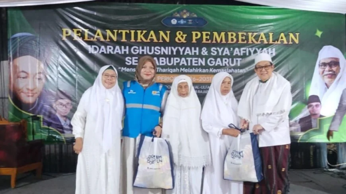 Pelantikan Ghusniyah sa'afiyah JATMAN Garut, Mudir Ali JATMAN bersama YBM PLN Salurkan Bantuan untuk Dhuafa